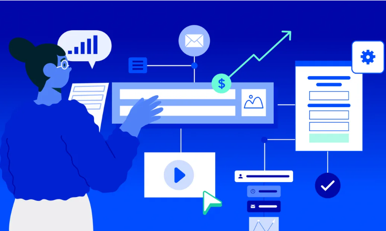 A person typing on a laptop at night, focused on multi-channel marketing automation tasks.